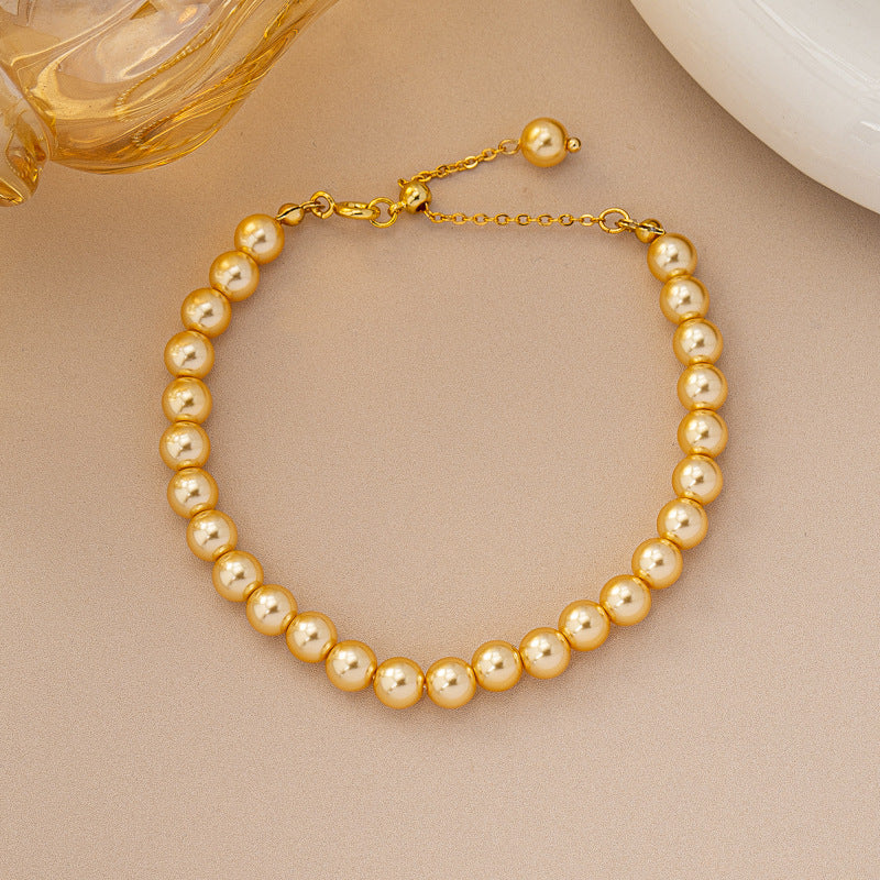 Golden Pearl Bracelet – GLOW Edition